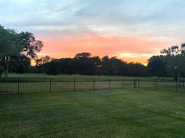 3014 Preston Club Dr, Sherman, TX 75092 - yard at dusk featuring a rural view