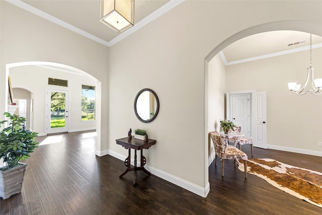 3014 Preston Club Dr, Sherman, TX 75092 - hall with arched walkways, dark wood-type flooring, and ornamental molding