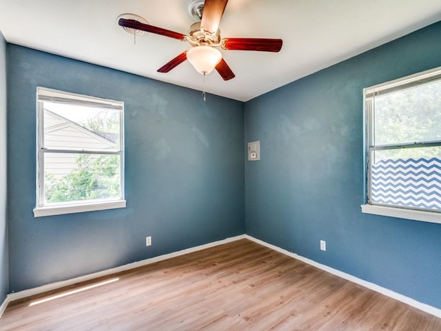 5316 Gordon Ave, Fort Worth, TX 76115 - unfurnished room featuring healthy amount of natural light, a ceiling fan, and wood finished floors