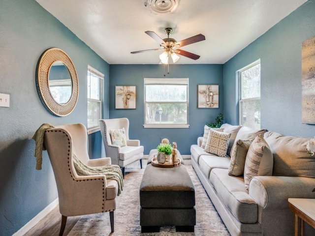 5316 Gordon Ave, Fort Worth, TX 76115 - living area featuring a ceiling fan and a textured wall