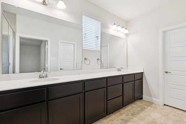 913 Parkside Dr, Argyle, TX 76226 - full bathroom featuring double vanity, a shower with shower door, and tile patterned flooring
