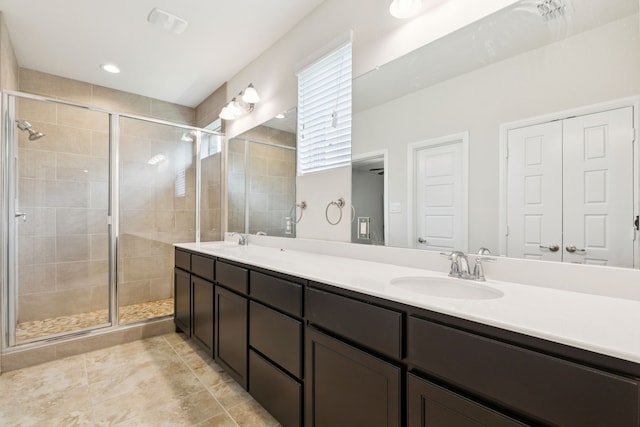 913 Parkside Dr, Argyle, TX 76226 - full bathroom featuring double vanity, a shower stall, and tile patterned flooring