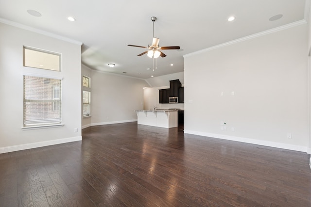 913 Parkside Dr, Argyle, TX 76226 - unfurnished living room featuring ornamental molding, a ceiling fan, recessed lighting, and dark wood-style floors