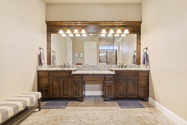 2213 Therese Dr, Waco, TX 76712 - full bathroom with double vanity, a shower, and stone finish flooring