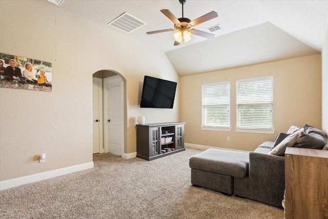 2213 Therese Dr, Waco, TX 76712 - living area featuring ceiling fan, carpet floors, vaulted ceiling, and arched walkways