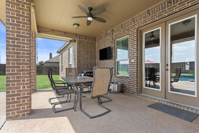 2213 Therese Dr, Waco, TX 76712 - view of patio featuring french doors, outdoor dining area, and ceiling fan