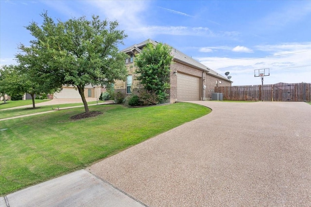 2213 Therese Dr, Waco, TX 76712 - view of front of property with concrete driveway, brick siding, and an attached garage