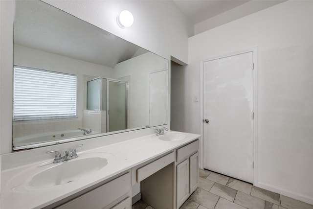 6414 Seaford Rd, Arlington, TX 76001 - bathroom with a stall shower, a bath, double vanity, and lofted ceiling