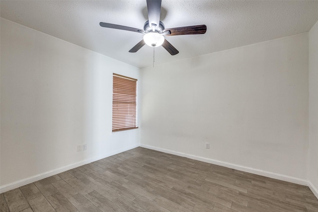 6414 Seaford Rd, Arlington, TX 76001 - empty room with wood finished floors and ceiling fan