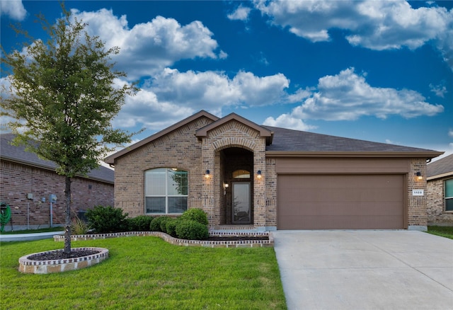 1109 Spanish Needle Trl, Fort Worth, TX 76177 - view of front of property featuring brick siding, concrete driveway, an attached garage, and a front yard