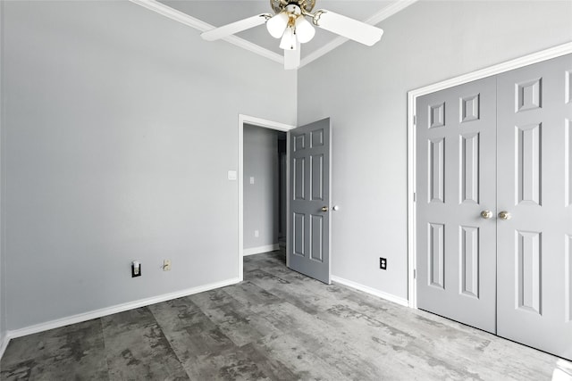 8301 Concord Dr, Rowlett, TX 75089 - unfurnished bedroom with crown molding, a closet, wood finished floors, and a ceiling fan
