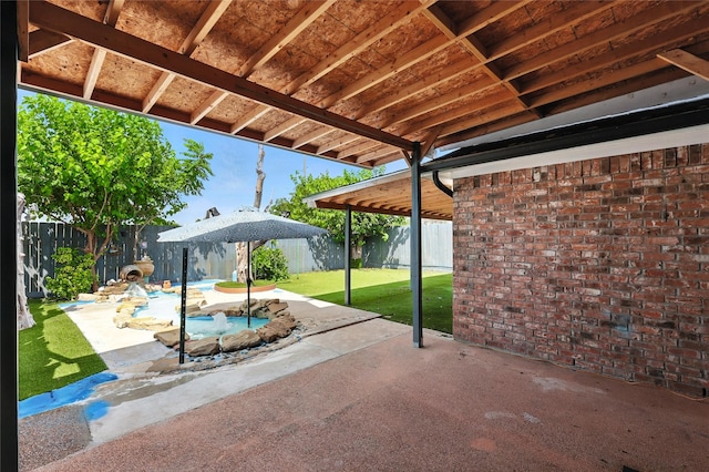 8301 Concord Dr, Rowlett, TX 75089 - fenced backyard with a patio area