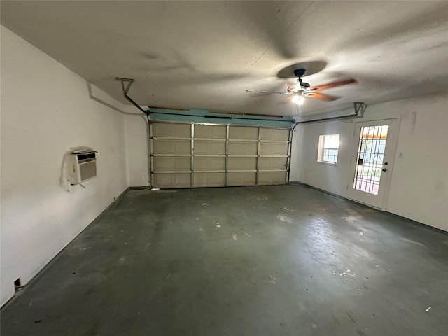8301 Concord Dr, Rowlett, TX 75089 - garage with a wall mounted AC and ceiling fan