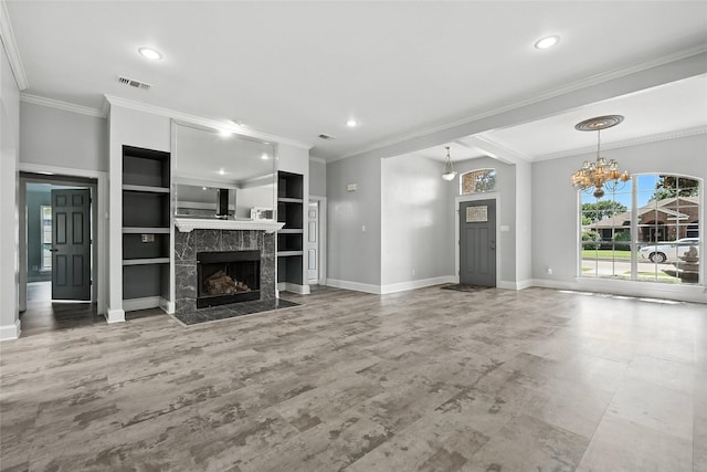 8301 Concord Dr, Rowlett, TX 75089 - unfurnished living room with ornamental molding, a high end fireplace, a chandelier, recessed lighting, and wood finished floors