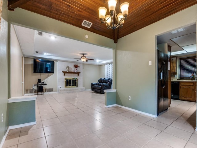 713 Bordner Dr, Lancaster, TX 75146 - living area with light tile patterned flooring, wooden ceiling, a fireplace, ceiling fan, and a chandelier