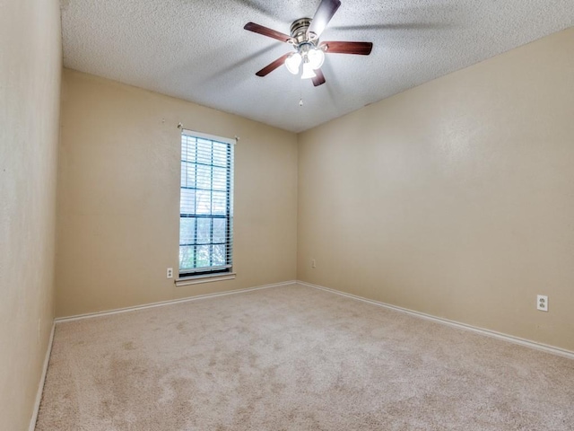 713 Bordner Dr, Lancaster, TX 75146 - carpeted empty room with ceiling fan and a textured ceiling
