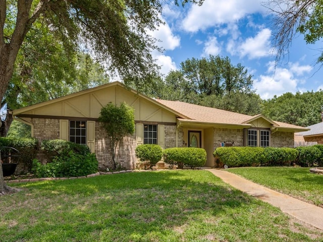 713 Bordner Dr, Lancaster, TX 75146 - ranch-style home with a front lawn and brick siding