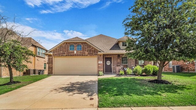 3513 Holly Rd, Melissa, TX 75454 - view of front facade with brick siding, concrete driveway, a front lawn, roof with shingles, and a garage