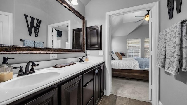 3513 Holly Rd, Melissa, TX 75454 - full bath featuring vaulted ceiling, double vanity, ensuite bathroom, a ceiling fan, and tile patterned flooring