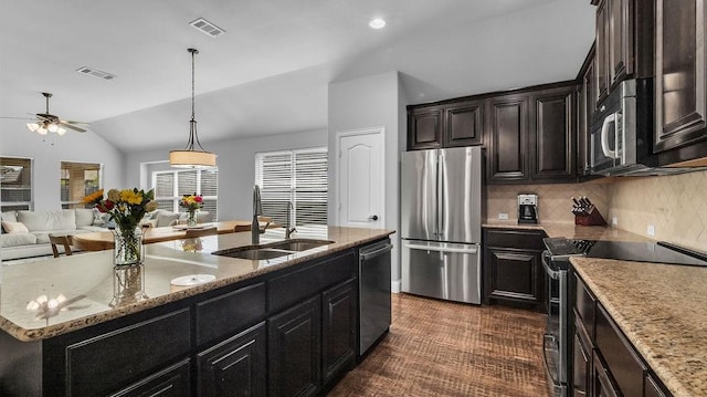 3513 Holly Rd, Melissa, TX 75454 - kitchen with stainless steel appliances, lofted ceiling, backsplash, ceiling fan, and open floor plan