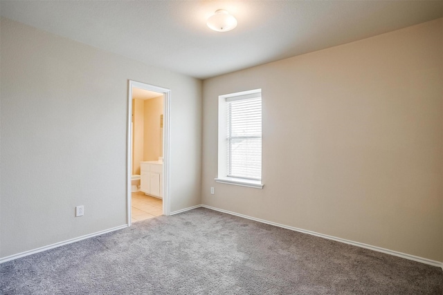 5831 Melanie Ct, Fort Worth, TX 76131 - spare room featuring light carpet and baseboards