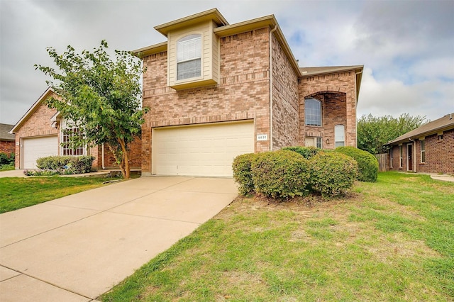 5831 Melanie Ct, Fort Worth, TX 76131 - front facade featuring a garage, brick siding, a front lawn, and driveway