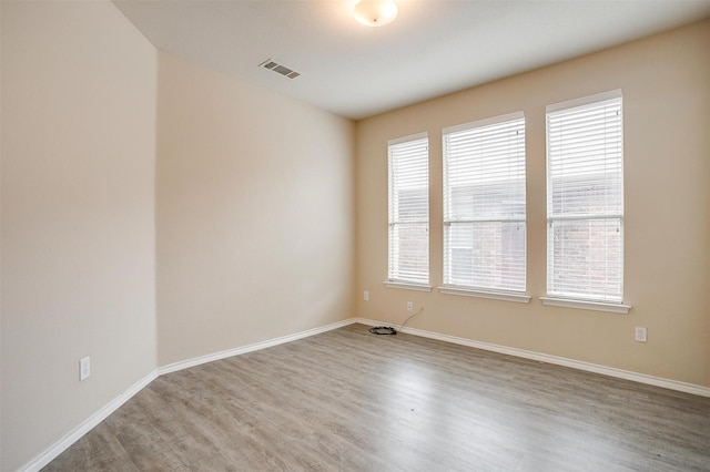 5831 Melanie Ct, Fort Worth, TX 76131 - spare room featuring wood finished floors