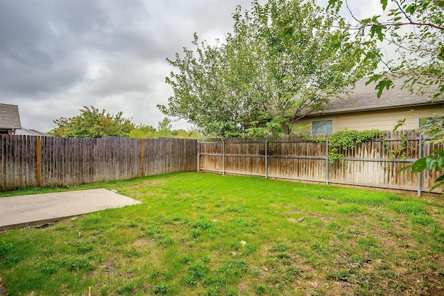 5831 Melanie Ct, Fort Worth, TX 76131 - fenced backyard with a patio area