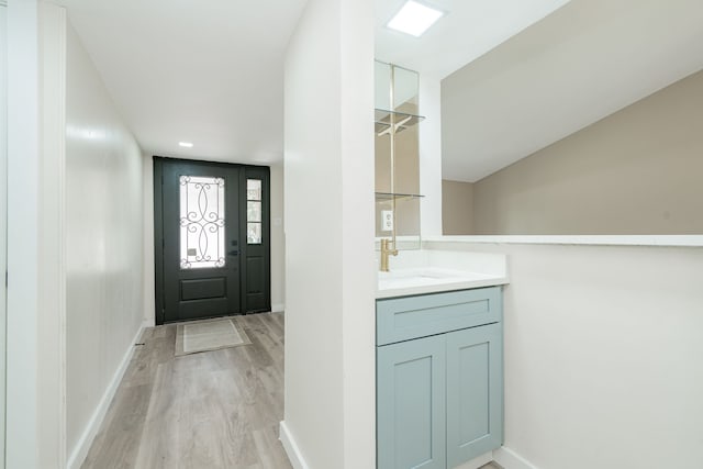 3733 Magnolia Dr, Grand Prairie, TX 75052 - entryway featuring light wood finished floors and baseboards