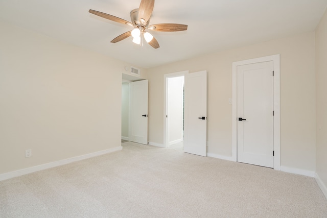 3733 Magnolia Dr, Grand Prairie, TX 75052 - unfurnished bedroom with light colored carpet and ceiling fan