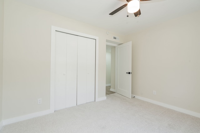 3733 Magnolia Dr, Grand Prairie, TX 75052 - unfurnished bedroom with carpet floors, a closet, and a ceiling fan