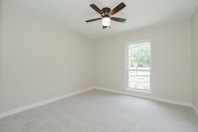 3733 Magnolia Dr, Grand Prairie, TX 75052 - carpeted empty room with baseboards and a ceiling fan