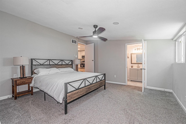 5307 Kelly Elliott, Arlington, TX 76017 - bedroom with light colored carpet, a ceiling fan, and ensuite bath