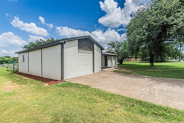 5307 Kelly Elliott, Arlington, TX 76017 - view of outbuilding with concrete driveway and an attached garage