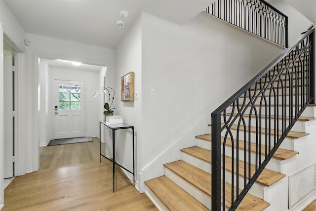 208 Rockwood Park Dr, Fort Worth, TX 76107 - foyer entrance featuring wood finished floors and stairs