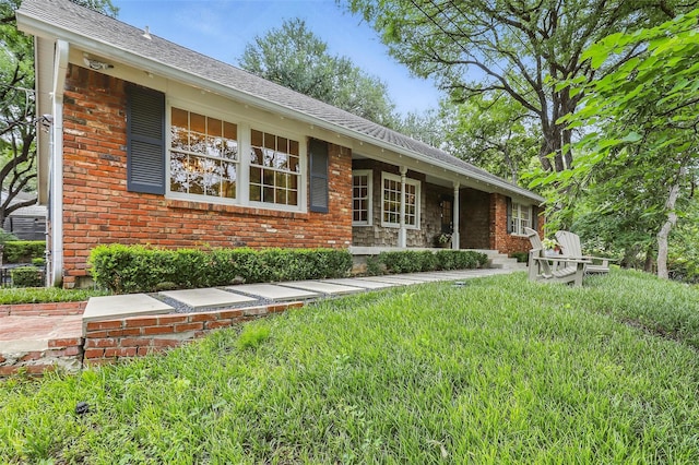 208 Rockwood Park Dr, Fort Worth, TX 76107 - ranch-style house featuring brick siding, covered porch, a front lawn, and a shingled roof