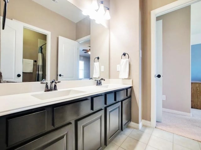 301 Komron Ct, Prosper, TX 75078 - bathroom featuring double vanity, ceiling fan, tile patterned floors, and a shower with curtain