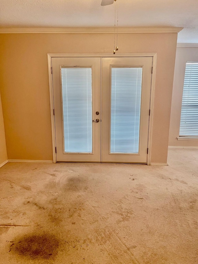 817 W Harwood Rd Unit B, Hurst, TX 76054 - entryway featuring crown molding, french doors, and carpet floors