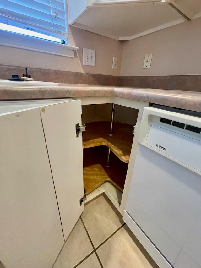 817 W Harwood Rd Unit B, Hurst, TX 76054 - kitchen view of white dishwasher and white cabinets