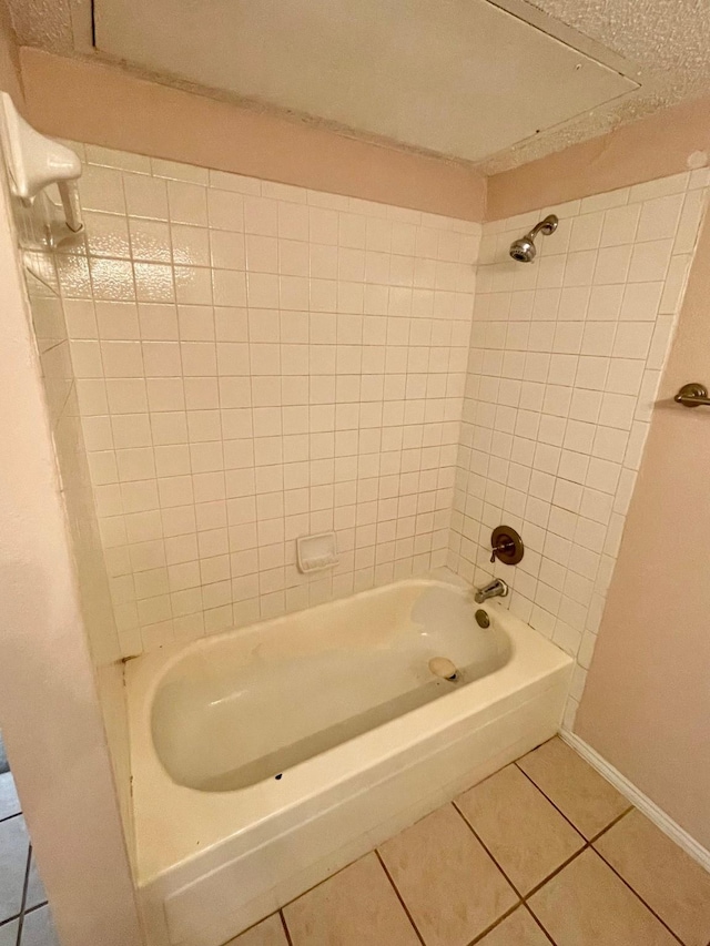 817 W Harwood Rd Unit B, Hurst, TX 76054 - bathroom with tile patterned flooring and  shower combination