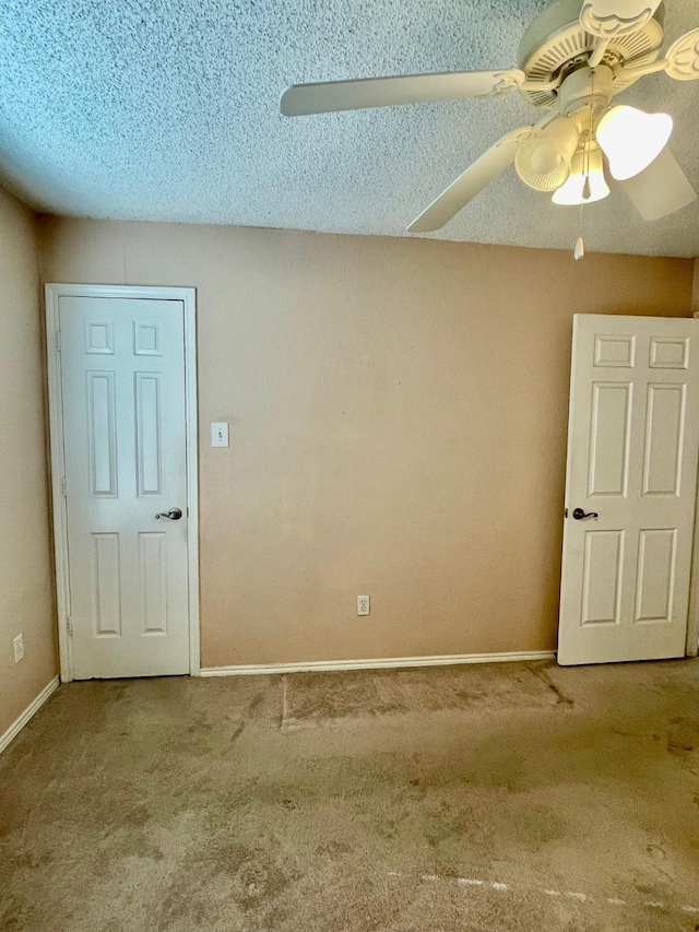 817 W Harwood Rd Unit B, Hurst, TX 76054 - spare room featuring carpet floors, ceiling fan, and a textured ceiling