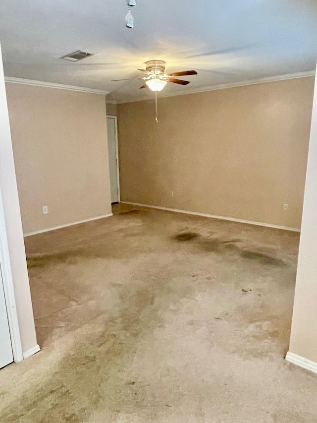 817 W Harwood Rd Unit B, Hurst, TX 76054 - empty room featuring ornamental molding, ceiling fan, and carpet