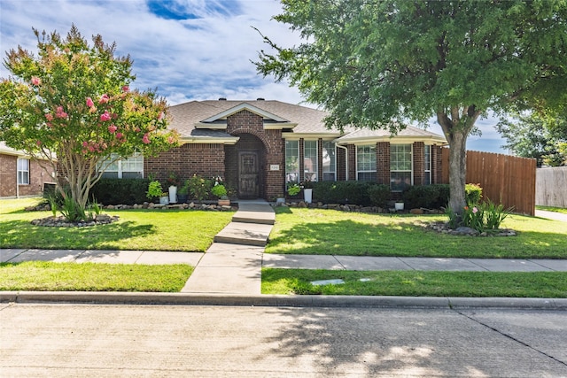 7210 Mercurys Rd, Rowlett, TX 75089 - ranch-style house with brick siding and a shingled roof