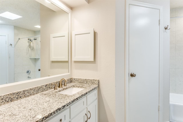 1704 Edge Hill Rd, Benbrook, TX 76126 - full bath featuring vanity, shower / tub combination, and a skylight