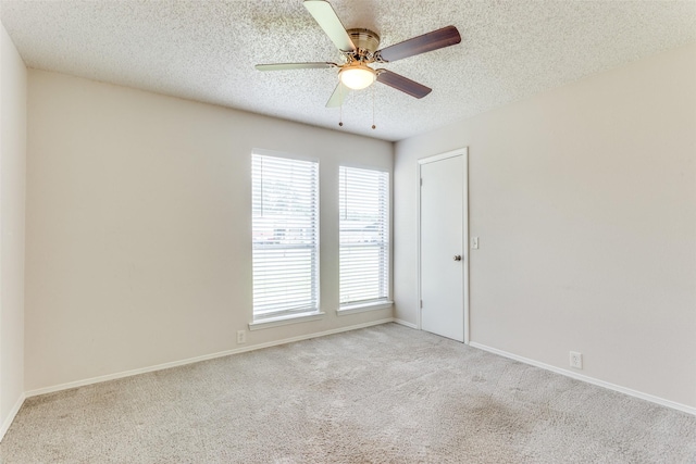 1704 Edge Hill Rd, Benbrook, TX 76126 - carpeted spare room with plenty of natural light, ceiling fan, and a textured ceiling