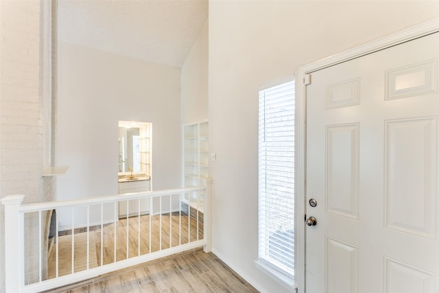 1704 Edge Hill Rd, Benbrook, TX 76126 - entryway with light wood-style flooring and healthy amount of natural light