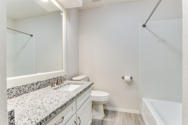 1704 Edge Hill Rd, Benbrook, TX 76126 - full bath featuring vanity, bathing tub / shower combination, and wood finished floors