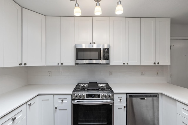 1513 Elk Grove Dr, Richardson, TX 75081 - kitchen featuring appliances with stainless steel finishes, white cabinetry, tasteful backsplash, and light countertops