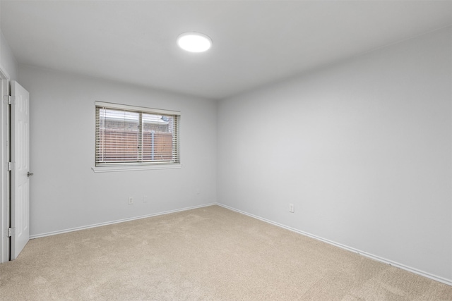 1513 Elk Grove Dr, Richardson, TX 75081 - unfurnished bedroom with carpet floors and baseboards