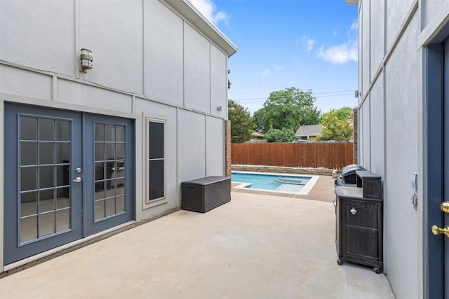 1513 Elk Grove Dr, Richardson, TX 75081 - fenced backyard featuring french doors and a patio area